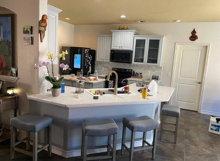 Bright kitchen with decorative orchids.