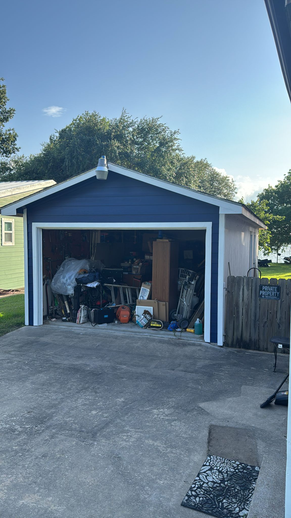 A cluttered garage filled with various items and tools.
